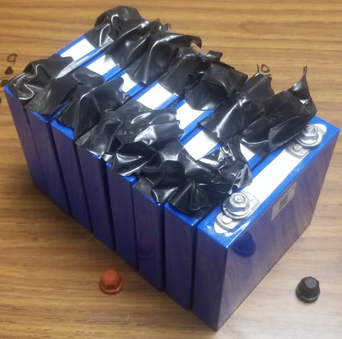 8x USED 3.2v 25ah Lifepo4 prismatic cells - Shelf Metal 4